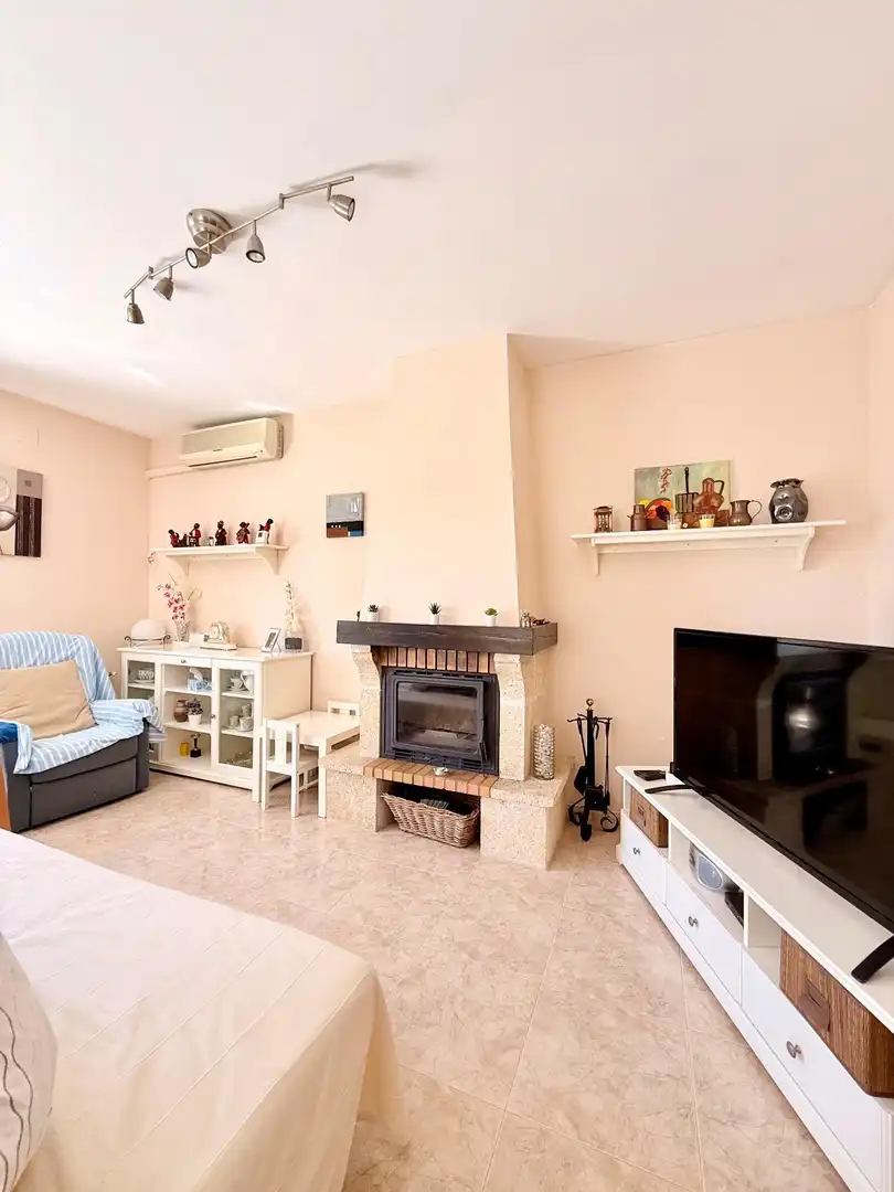 Living room of Houses for sale in Calafell  with Air Conditioner, Private garden and Terrace