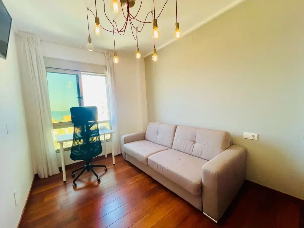 Sala d'estar de Dúplex en venda en La Manga del Mar Menor amb Aire condicionat, Calefacció i Jardí privat