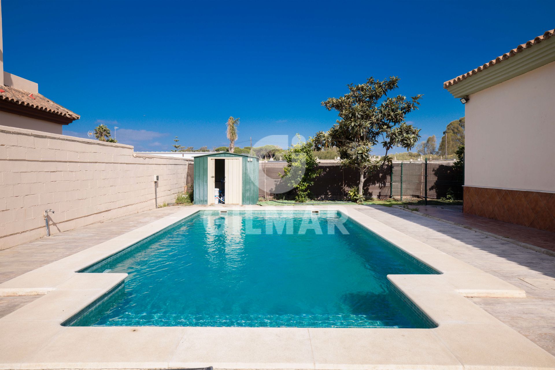 Piscina de Casa o xalet de lloguer en El Puerto de Santa María amb Aire condicionat, Jardí privat i Piscina