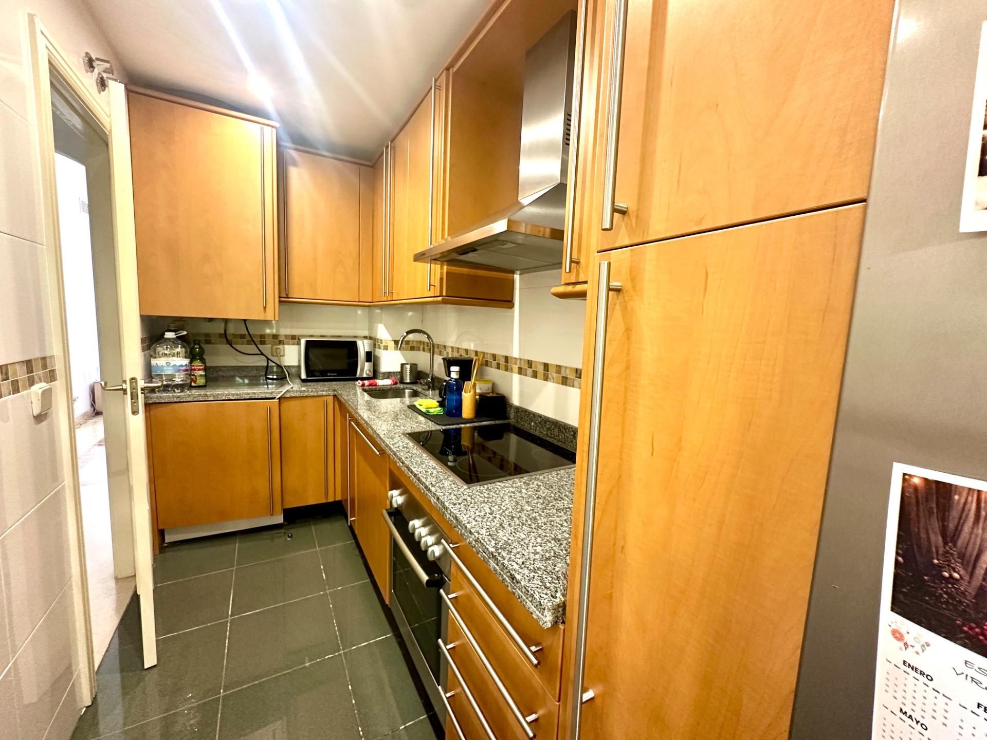 Cuina de Apartament en venda en Mijas amb Aire condicionat, Jardí privat i Terrassa