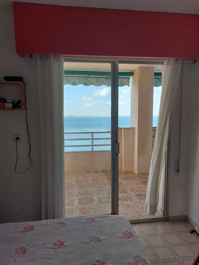 Habitación de Apartamento de alquiler en La Manga del Mar Menor con Terraza, Amueblado y Horno