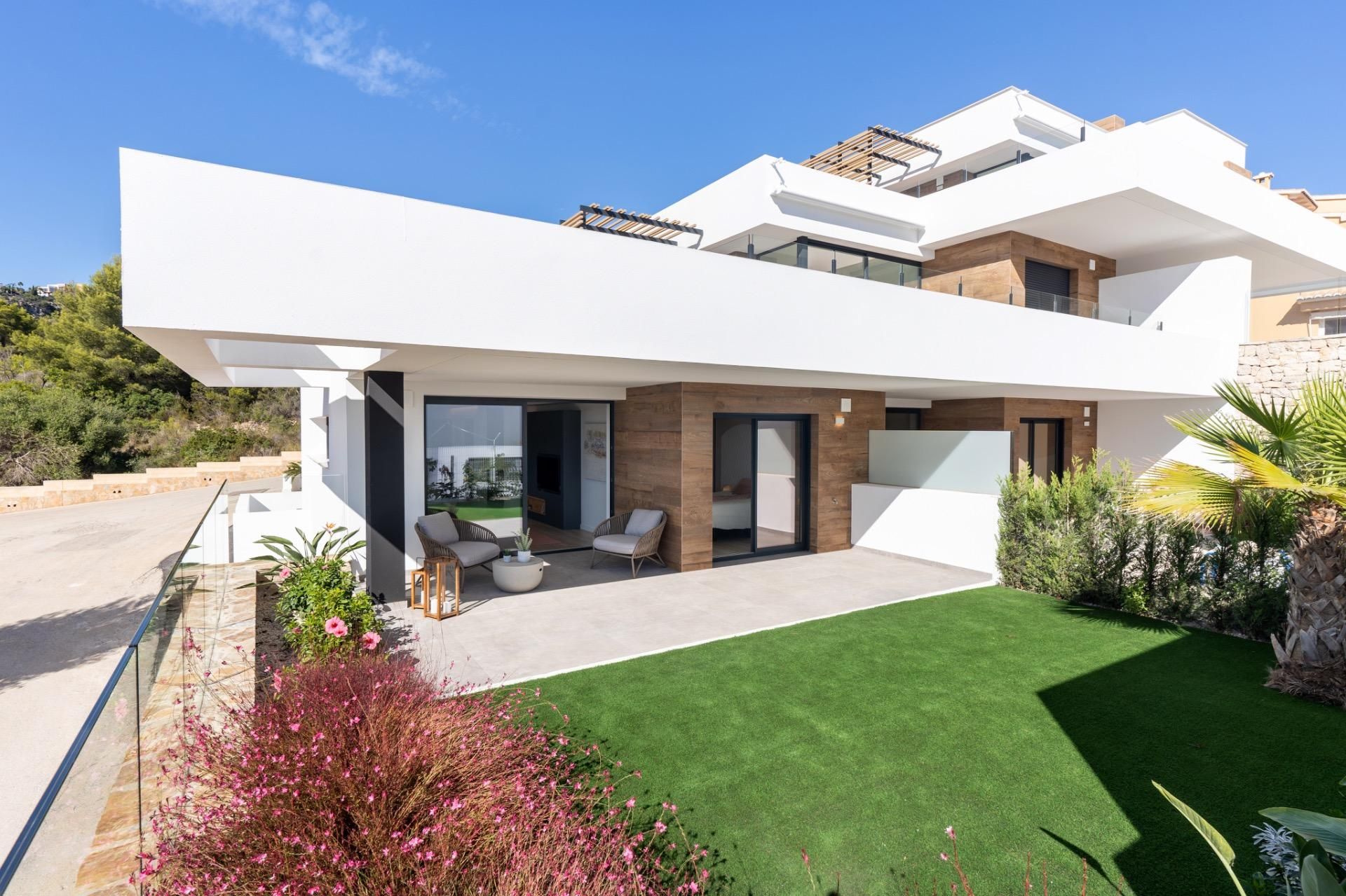 Exterior view of Duplex for sale in Benitachell / El Poble Nou de Benitatxell  with Air Conditioner, Heating and Private garden