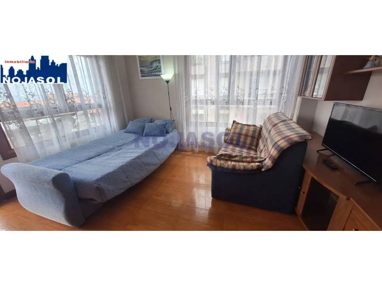 Dormitori de Apartament de lloguer en Noja amb Calefacció, Terrassa i Moblat