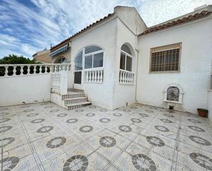 Exterior view of Single-family semi-detached for sale in Torrevieja  with Air Conditioner, Terrace and Swimming Pool