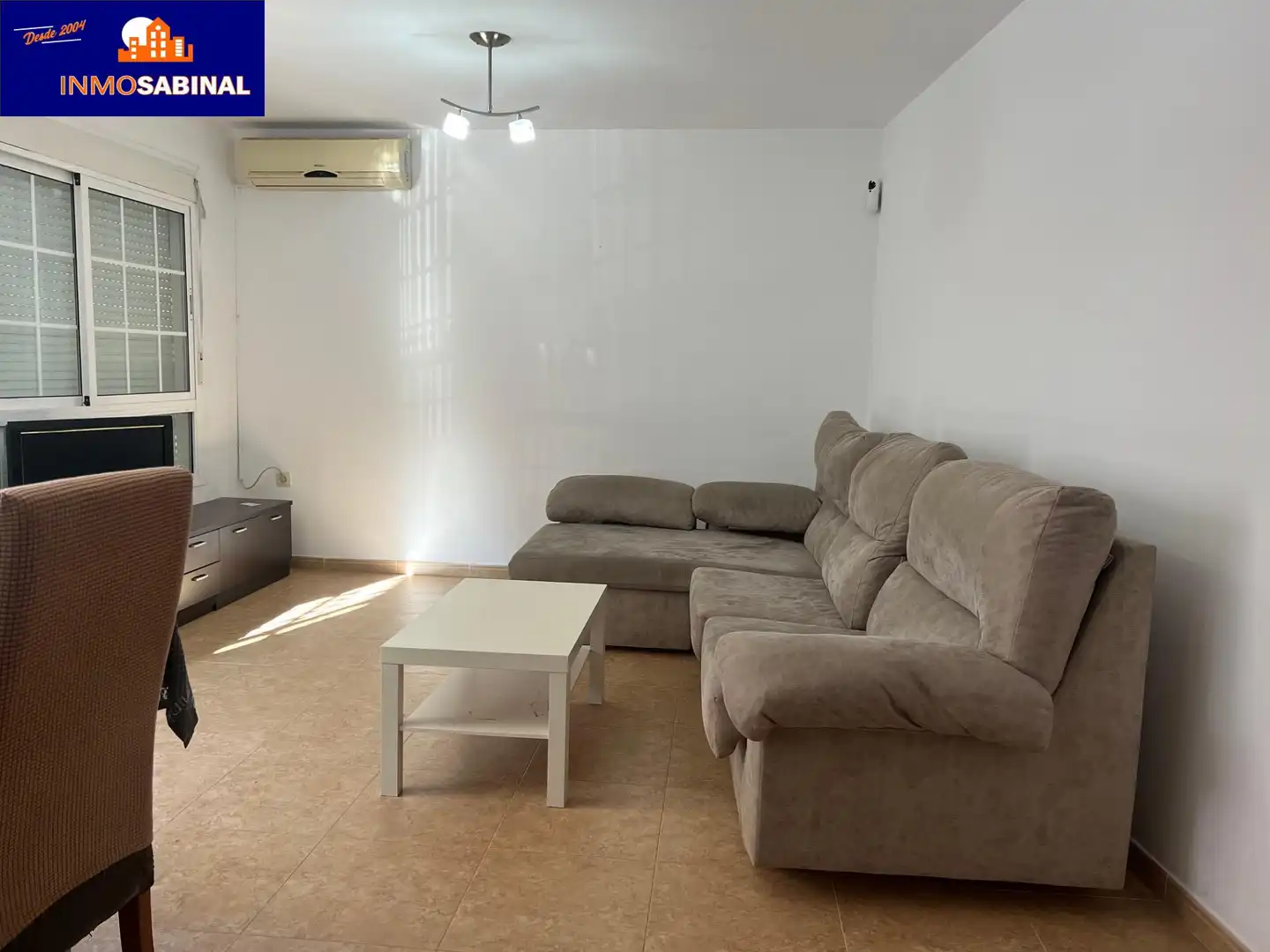 Sala d'estar de Casa adosada en venda en Roquetas de Mar amb Aire condicionat, Calefacció i Terrassa
