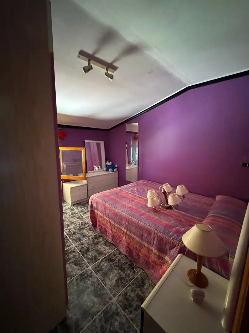 Dormitori de Casa adosada en venda en Alcañiz amb Terrassa, Traster i Piscina comunitària