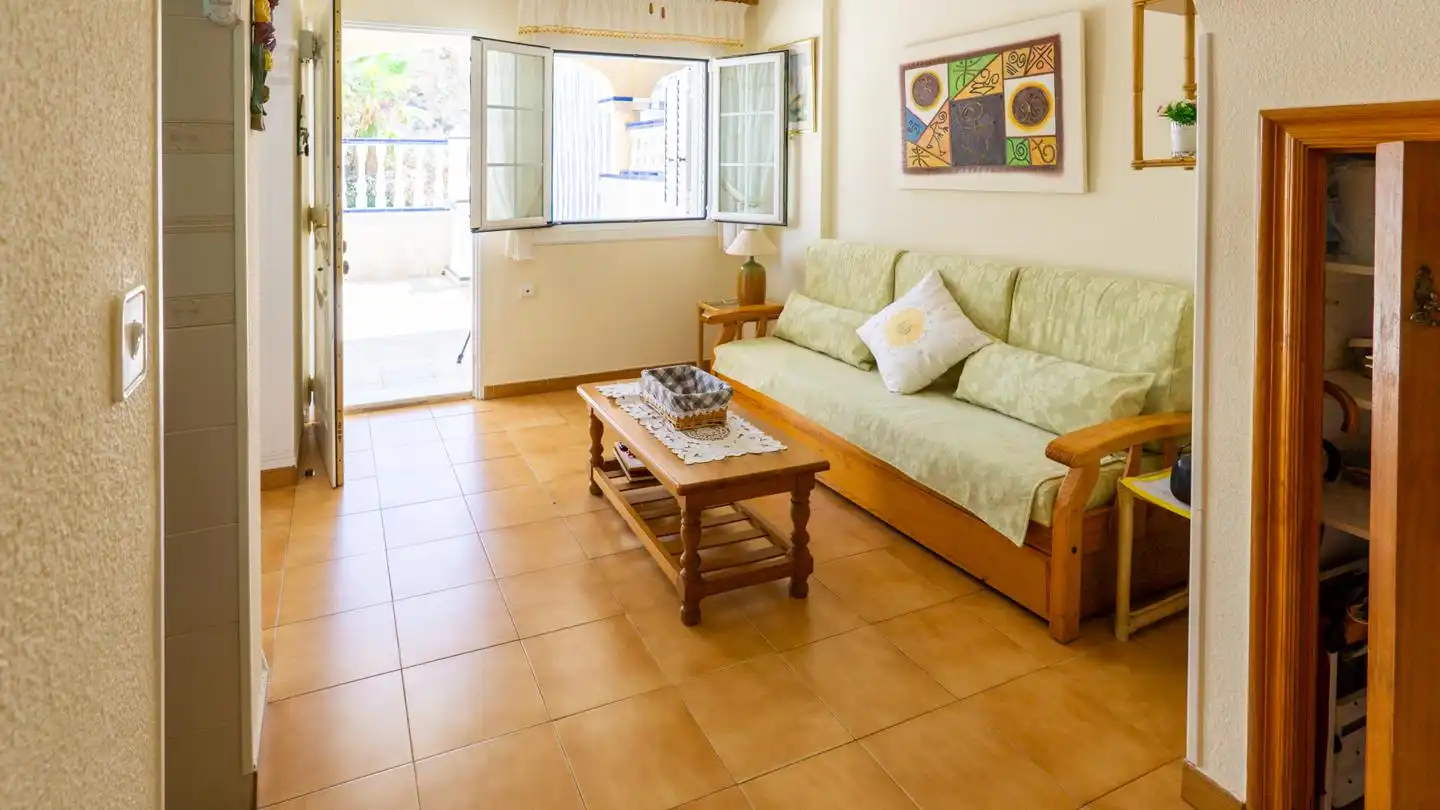 Sala de estar de Casa adosada en venta en Santa Pola con Terraza, Piscina y Amueblado