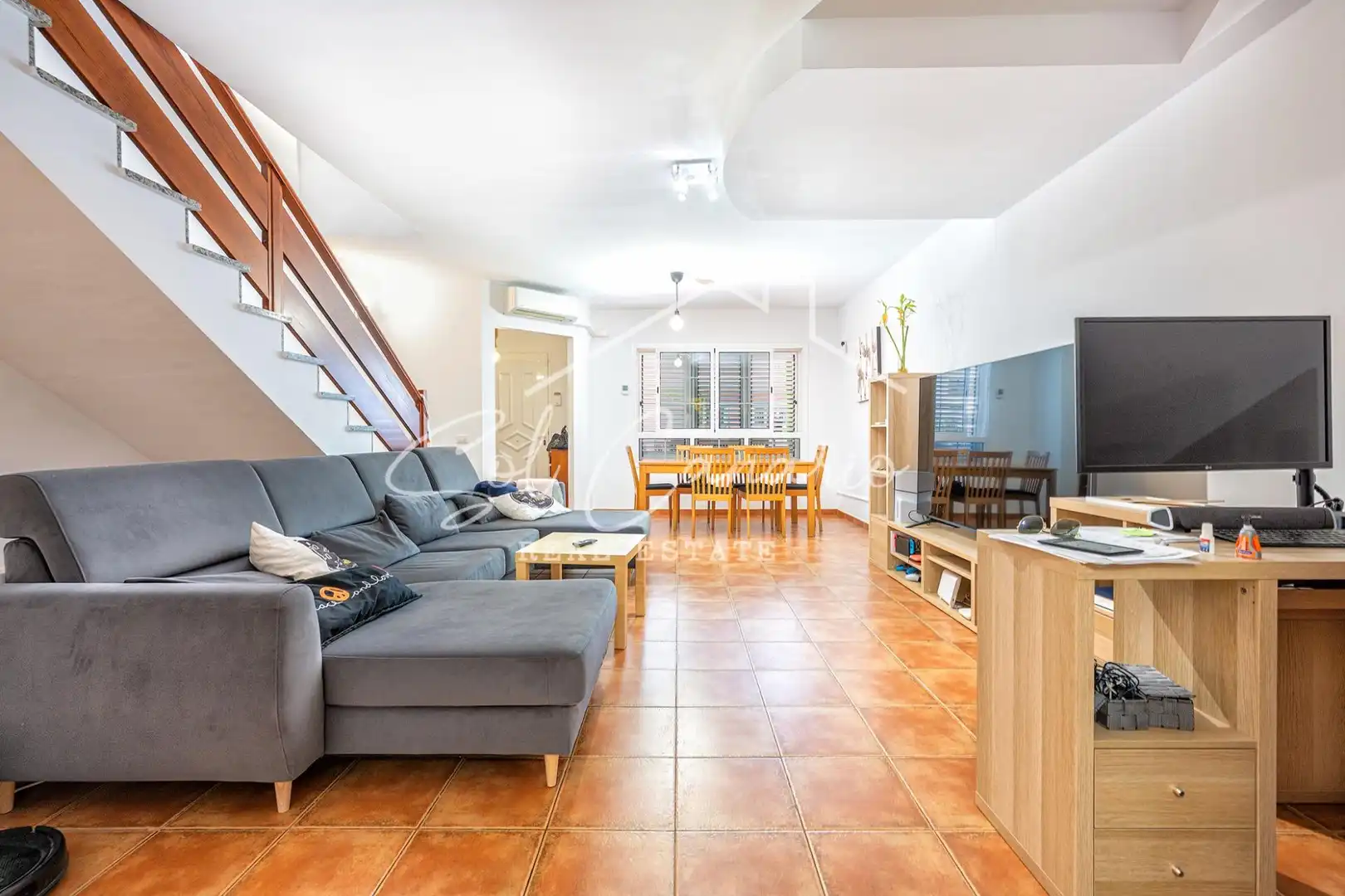 Sala d'estar de Casa adosada en venda en Santa Lucía de Tirajana amb Aire condicionat, Terrassa i Balcó