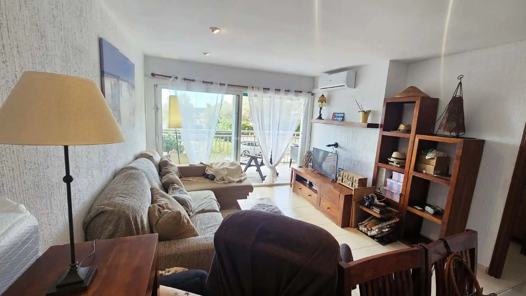 Sala d'estar de Apartament en venda en Sant Feliu de Guíxols amb Aire condicionat, Calefacció i Jardí privat