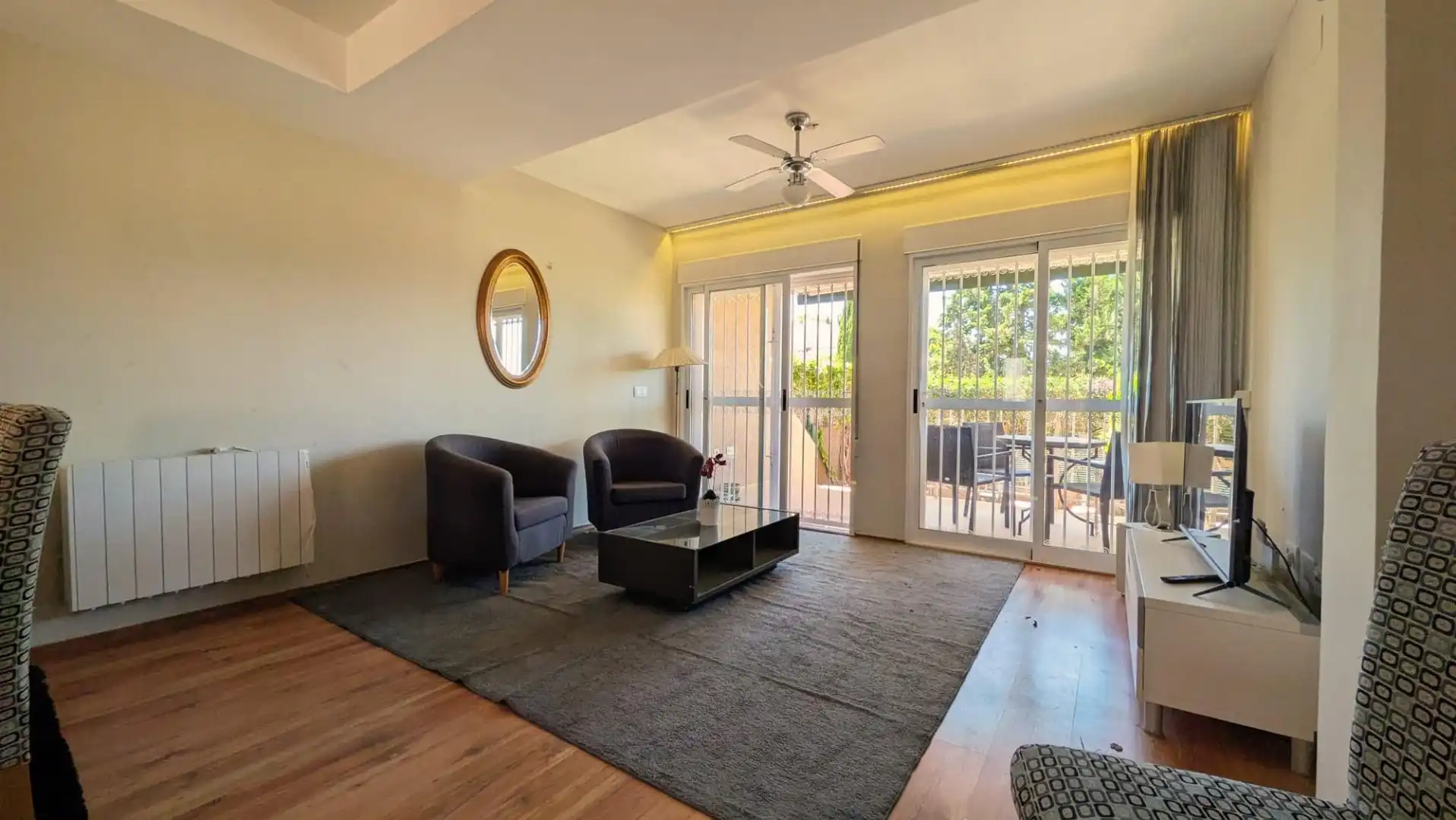 Sala de estar de Casa o chalet en venta en L'Alfàs del Pi con Aire acondicionado, Terraza y Piscina comunitaria