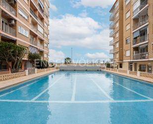 Piscina de Apartament de lloguer en La Pobla de Farnals amb Aire condicionat, Terrassa i Piscina