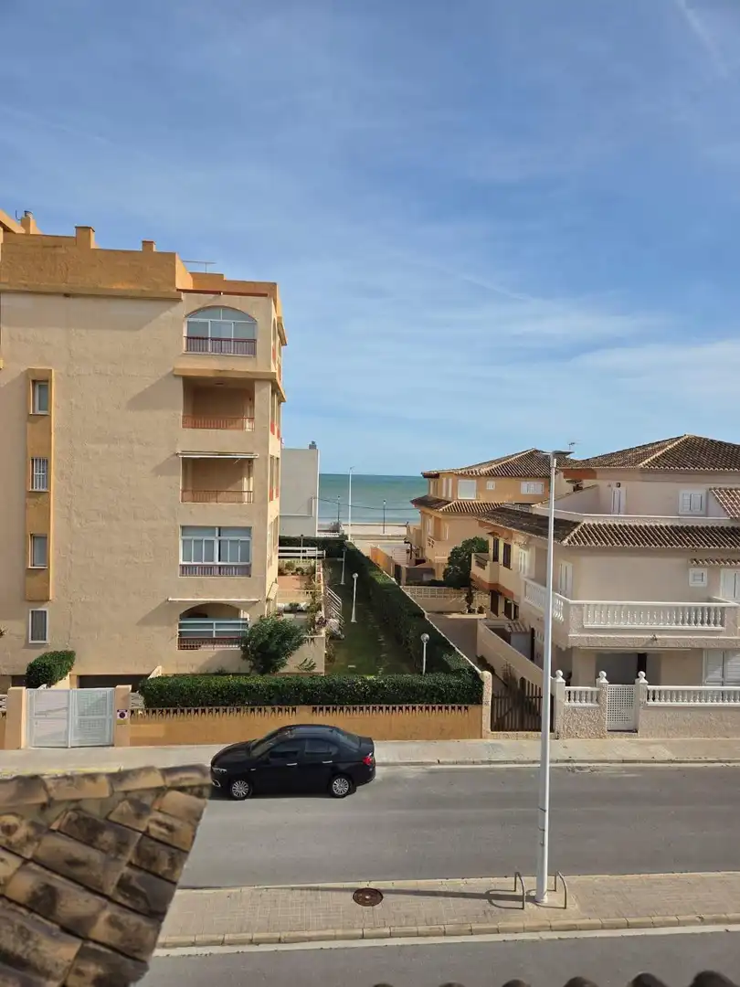 Habitación de Casa adosada en venta en Sueca con Aire acondicionado, Terraza y Amueblado
