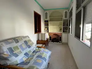 Sala d'estar de Casa adosada en venda en Mogán amb Jardí privat, Piscina i Moblat