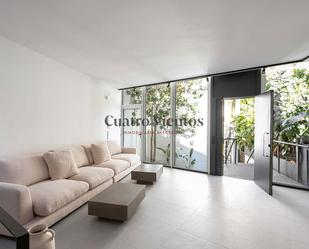 Sala d'estar de Casa adosada de lloguer en  Barcelona Capital amb Aire condicionat i Terrassa