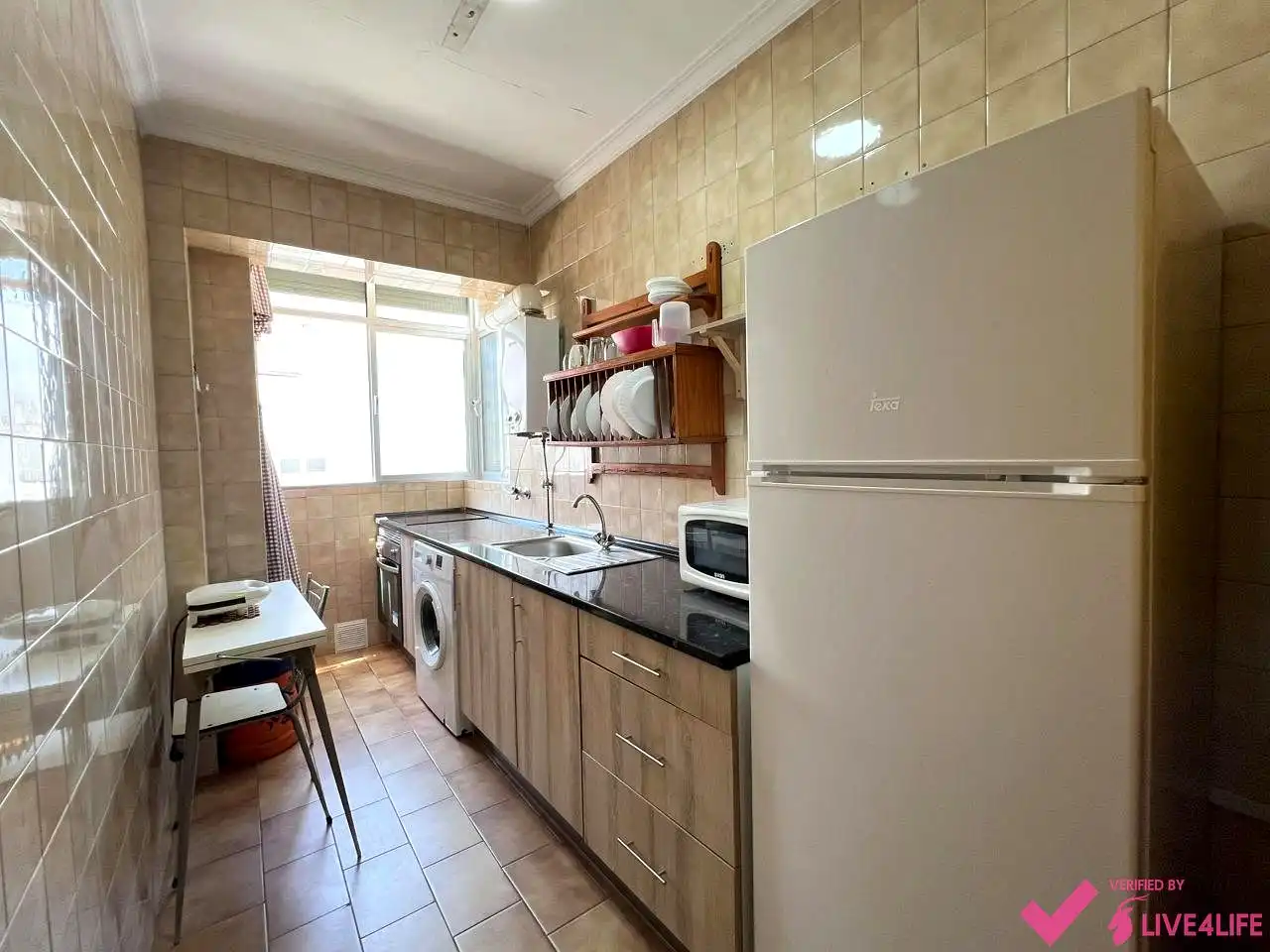 Kitchen of Flat for share in Sevilla  with Air Conditioner, Heating and Furnished