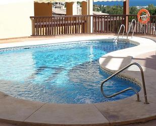 Swimming pool of Duplex for sale in Benalmádena  with Heating, Parquet flooring and Terrace