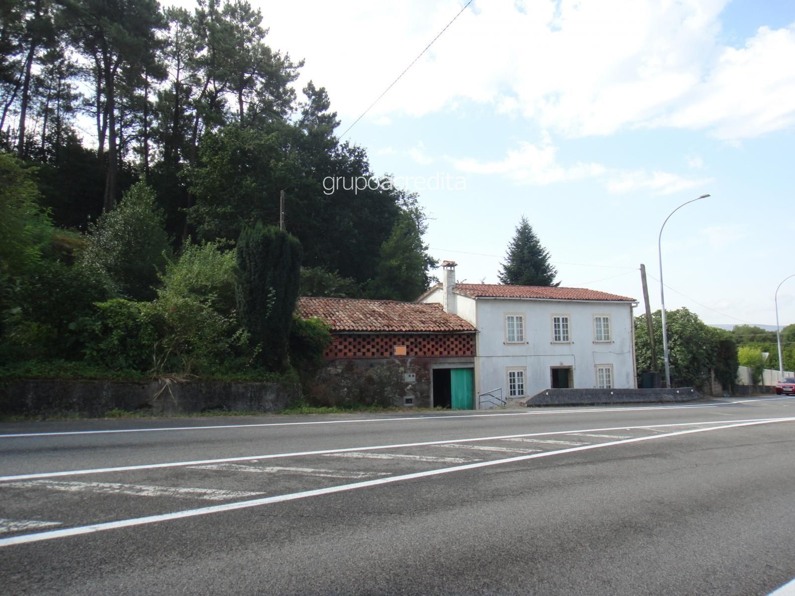 Vista exterior de Casa o xalet en venda en Santiago de Compostela  amb Calefacció, Jardí privat i Traster