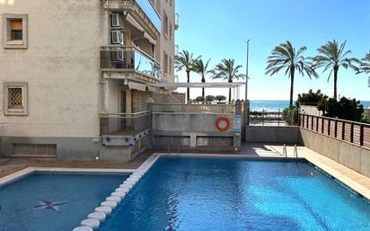 Swimming pool of Planta baja for sale in Calafell  with Air Conditioner, Heating and Parquet flooring