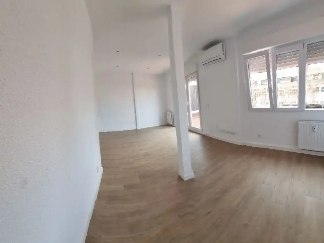 Sala de estar de Ático de alquiler en Madrid con Aire acondicionado