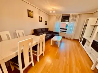 Sala de estar de Apartamento de alquiler en Villaquilambre con Calefacción, Parquet y Terraza