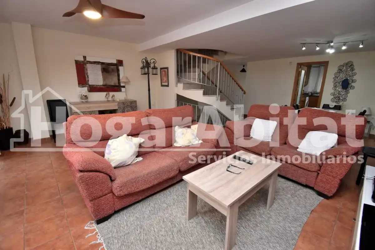 Sala d'estar de Casa adosada en venda en Burriana / Borriana amb Jardí privat, Terrassa i Piscina comunitària