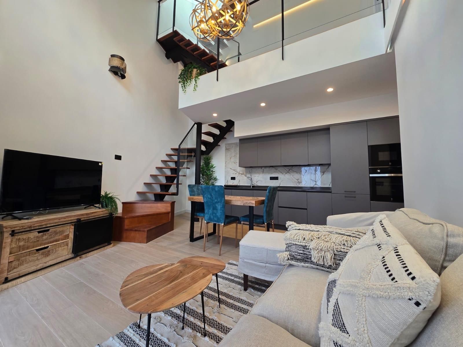 Living room of Duplex to rent in Sanlúcar la Mayor  with Air Conditioner and Terrace