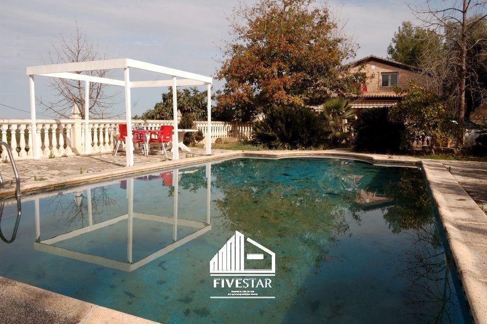 Swimming pool of House or chalet for sale in Genovés  with Air Conditioner, Heating and Storage room