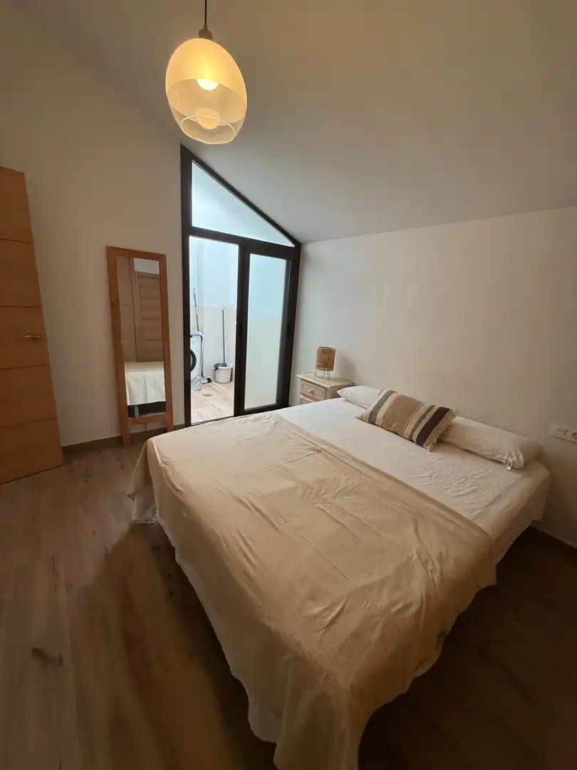 Dormitori de Apartament de lloguer en Málaga amb Aire condicionat i Calefacció