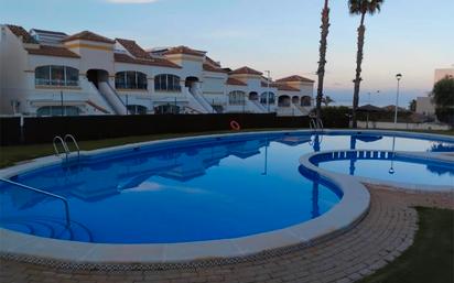 Piscina de Casa adosada en venda en Santa Pola amb Jardí privat, Terrassa i Traster