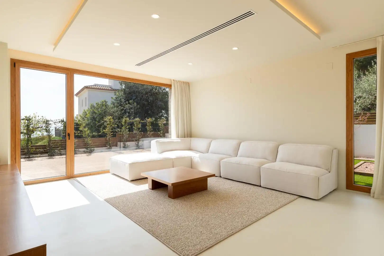 Sala de estar de Casa o chalet en venta en L'Ampolla con Aire acondicionado, Calefacción y Jardín privado