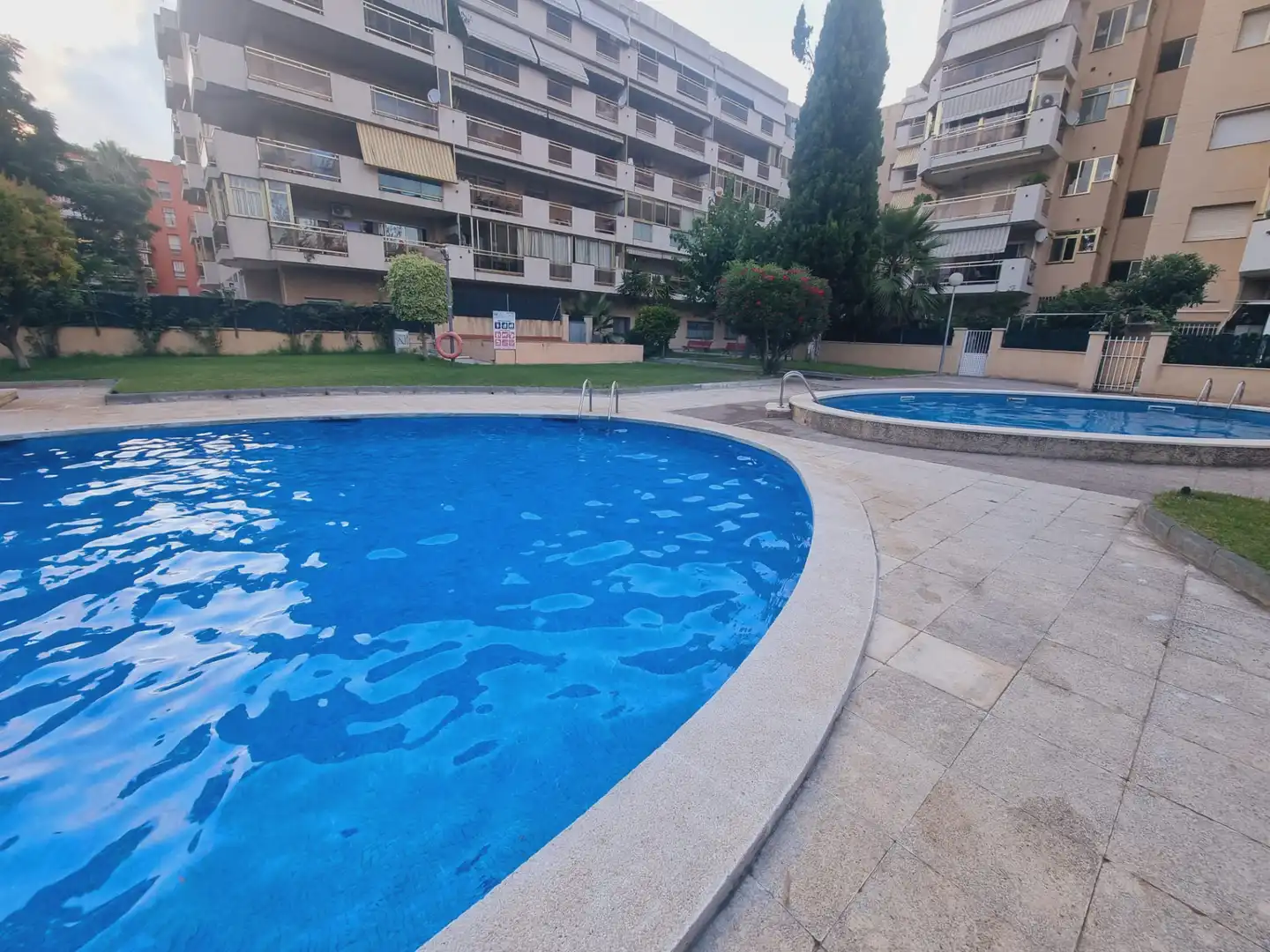 Swimming pool of Flat for sale in Salou  with Air Conditioner, Heating and Parquet flooring