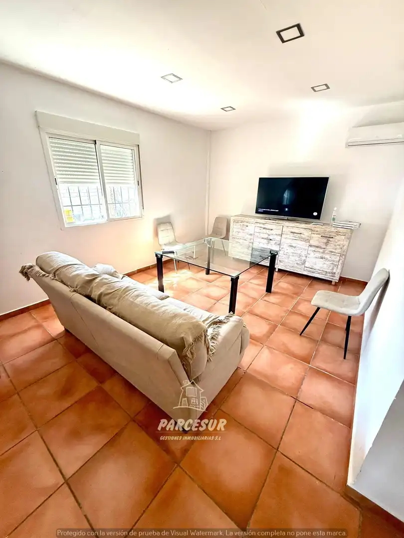 Sala d'estar de Casa o xalet en venda en Córdoba amb Aire condicionat i Jardí privat