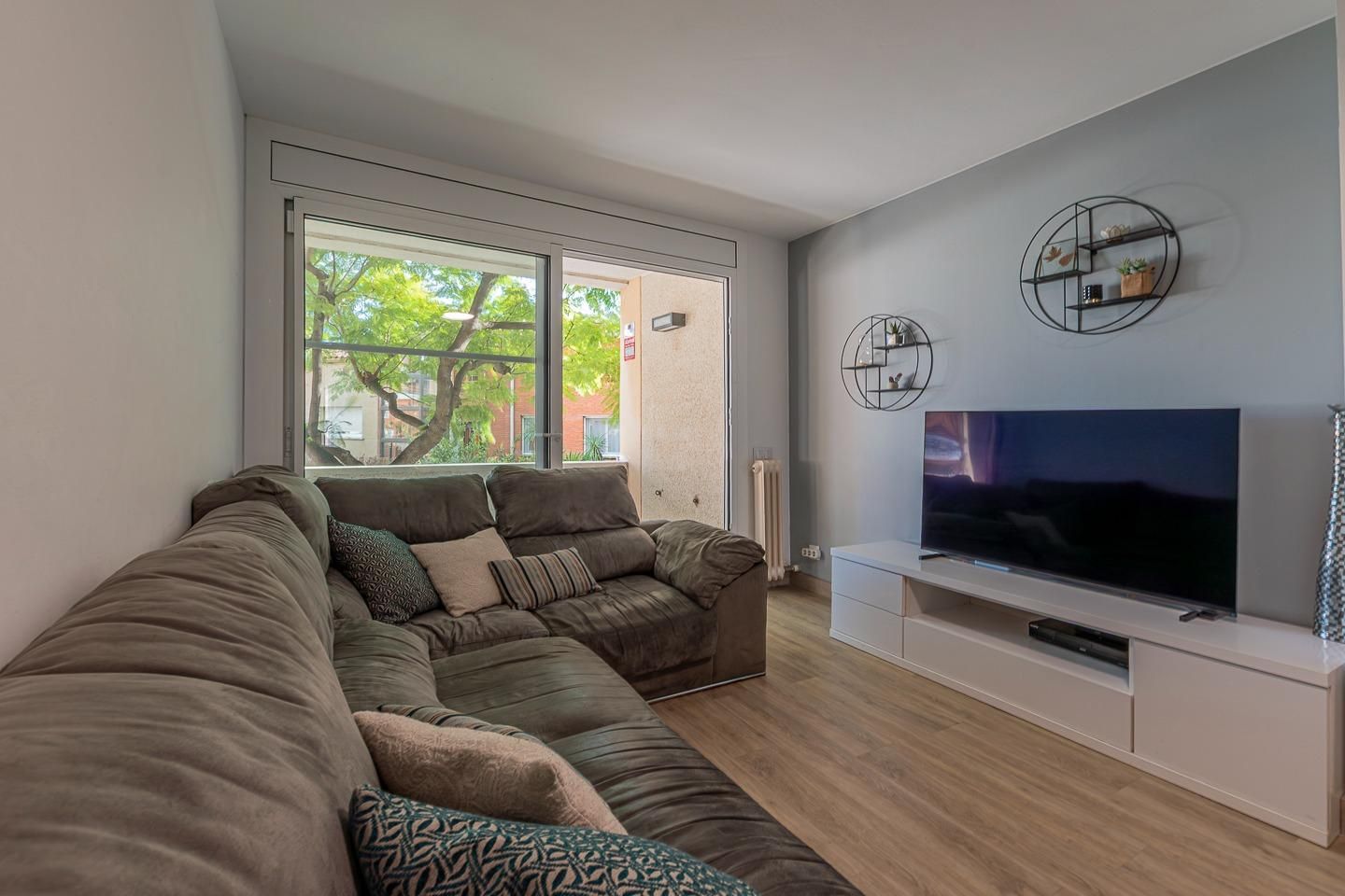 Living room of Planta baja for sale in El Masnou  with Heating, Parquet flooring and Terrace