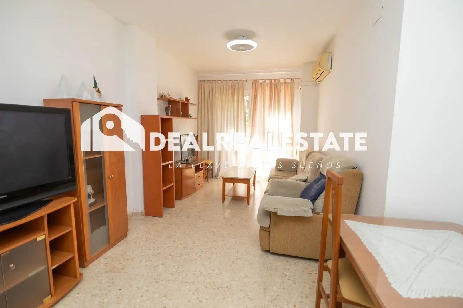 Sala d'estar de Pis en venda en La Rinconada amb Aire condicionat, Terrassa i Moblat