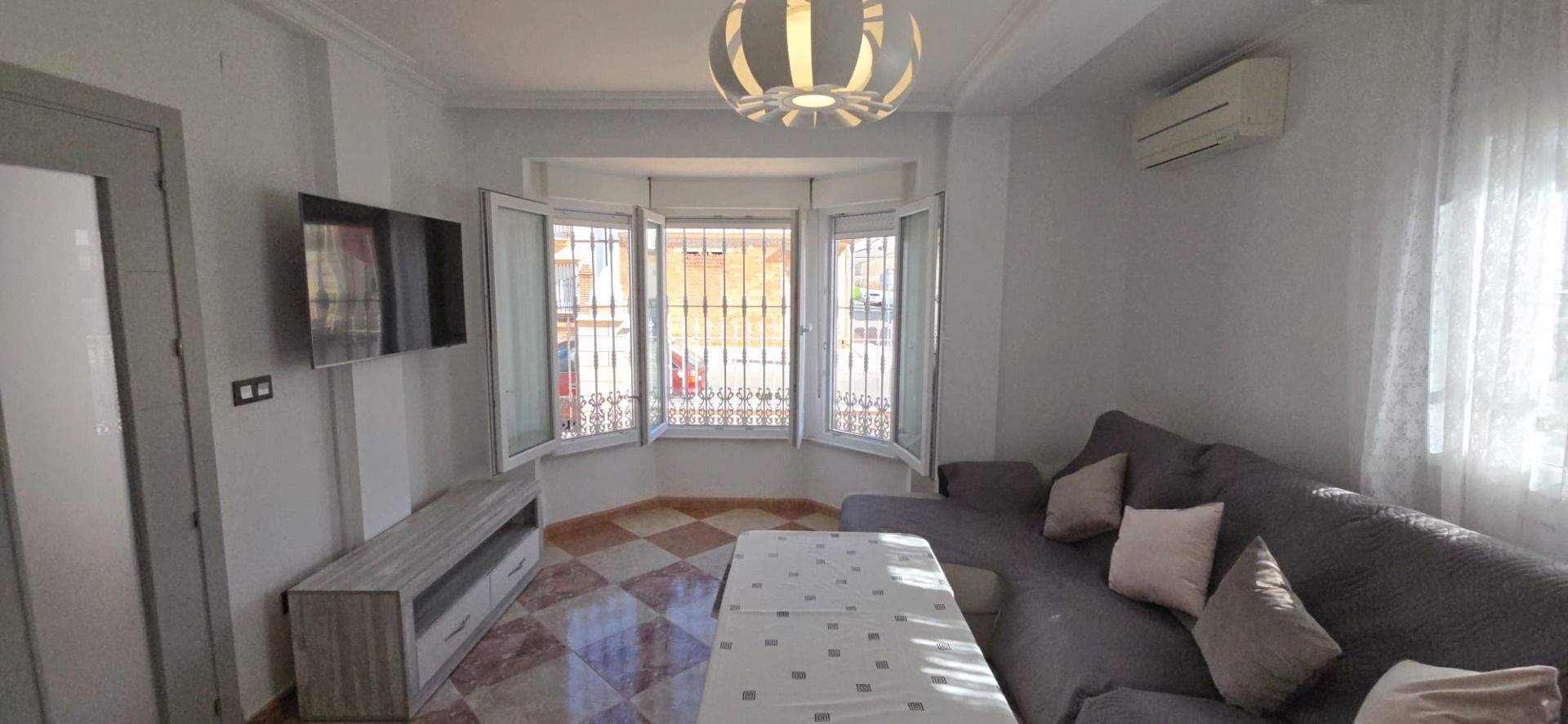 Sala de estar de Casa adosada en venta en Campillos con Aire acondicionado y Alarma