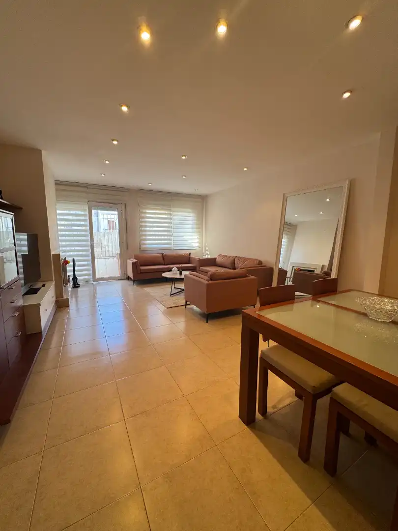 Sala d'estar de Dúplex de lloguer en Calella amb Aire condicionat, Calefacció i Terrassa
