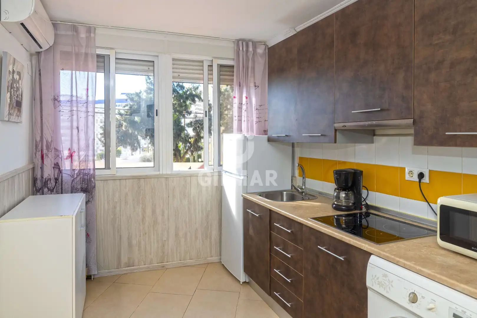 Küche von Wohnung zum Verkauf in Benalmádena mit Heizung, Privatgarten und Schwimmbad