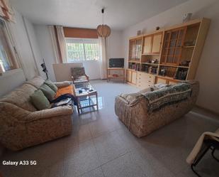Sala d'estar de Casa adosada en venda en Águilas amb Jardí privat, Terrassa i Traster