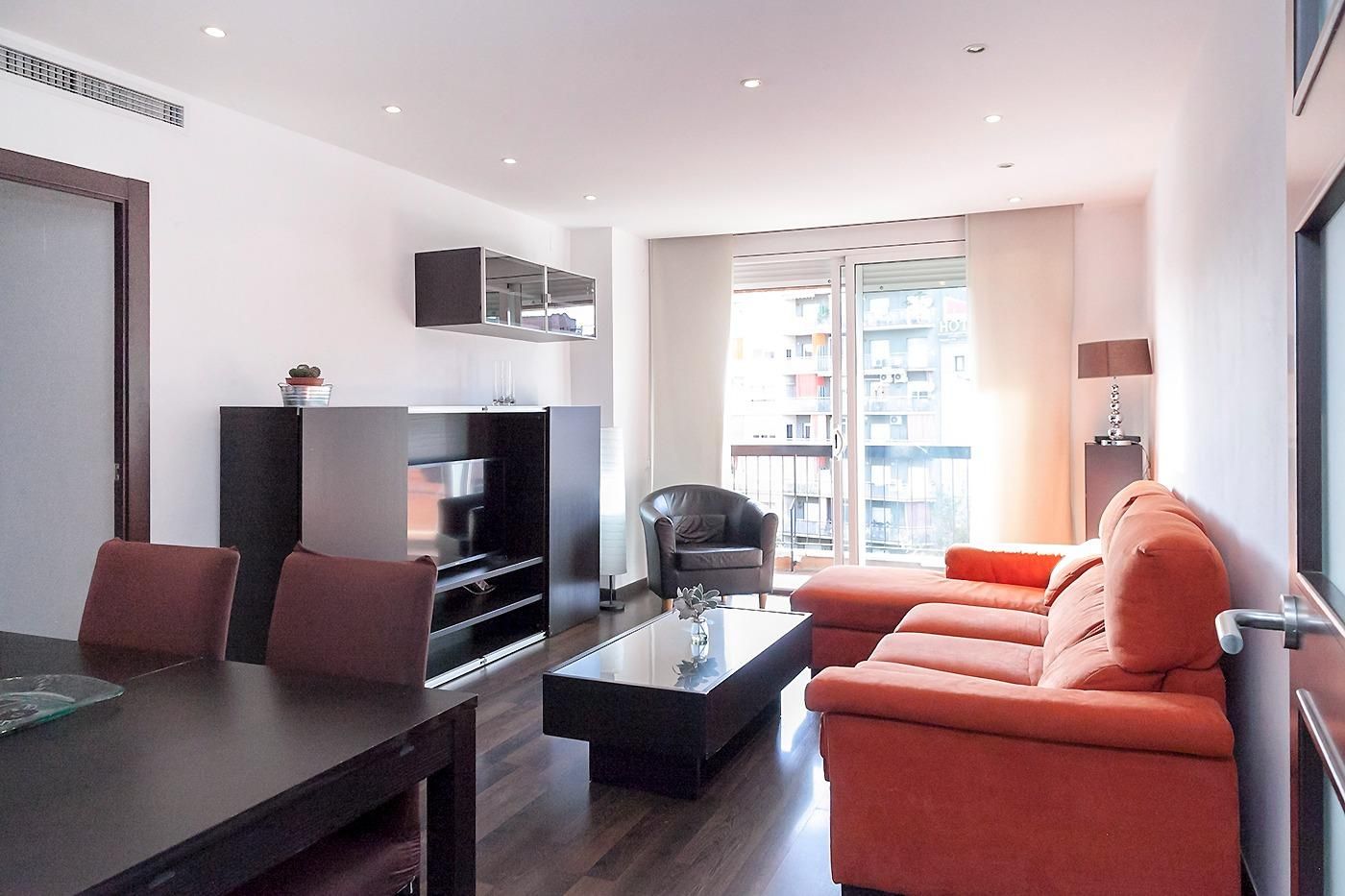 Sala d'estar de Pis de lloguer en  Barcelona Capital amb Calefacció, Parquet i Terrassa