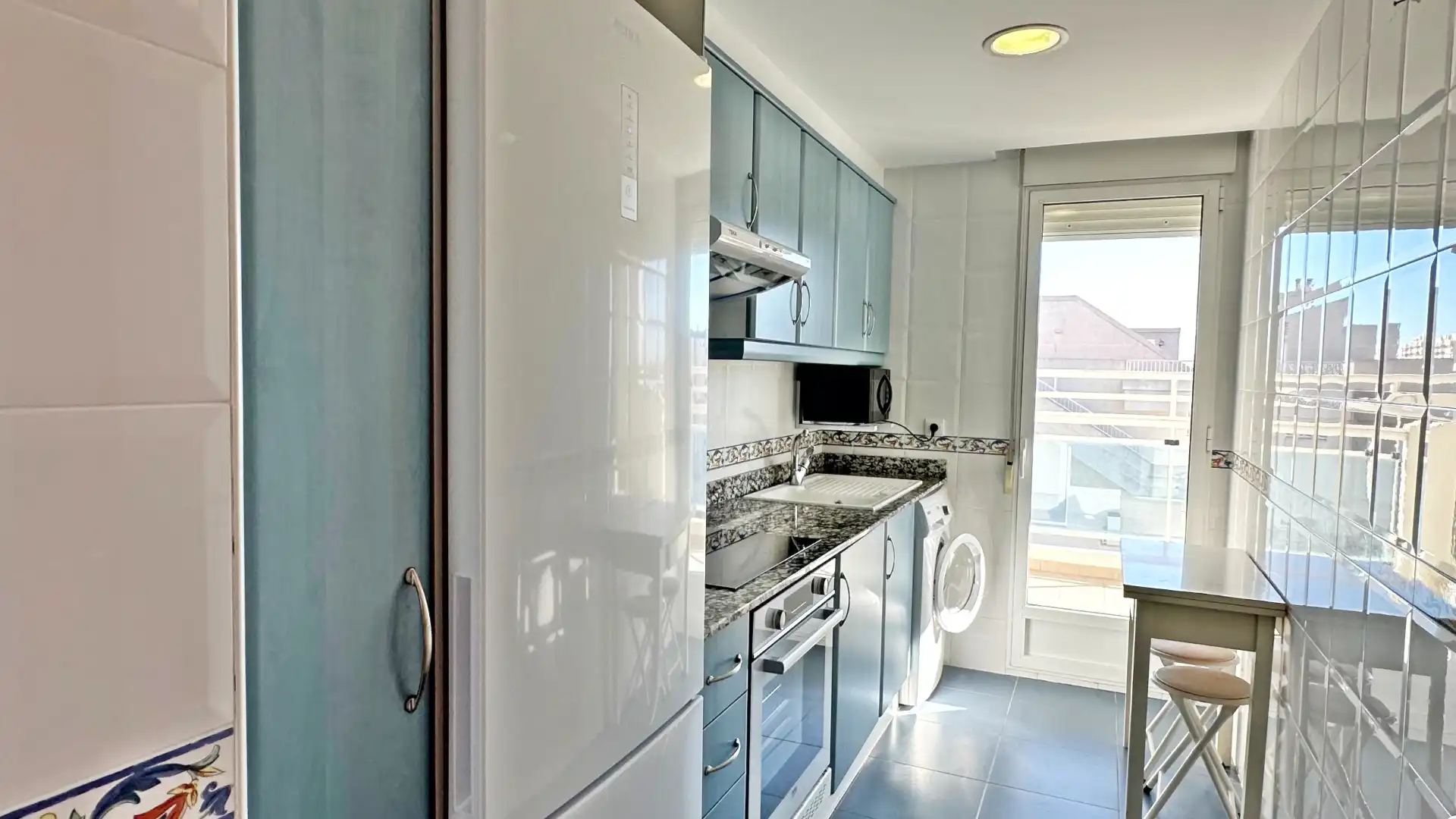 Cuina de Apartament de lloguer en Gandia amb Aire condicionat, Calefacció i Terrassa