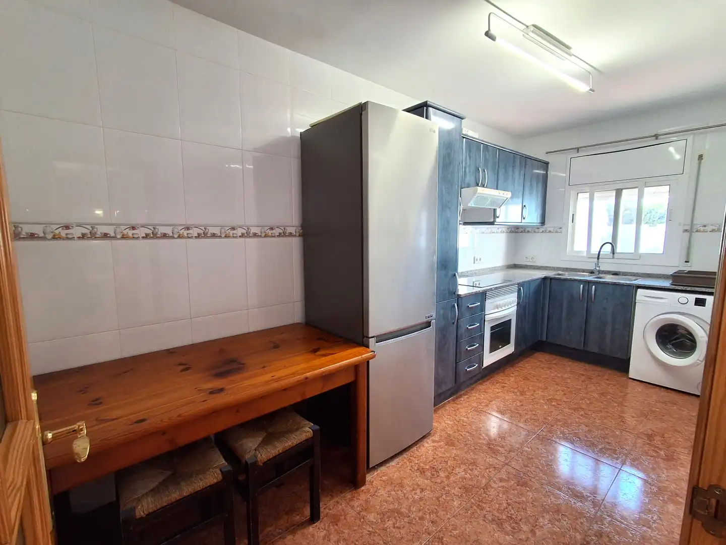 Küche von Einfamilien-Reihenhaus zum Verkauf in Mont-roig del Camp mit Klimaanlage, Privatgarten und Terrasse