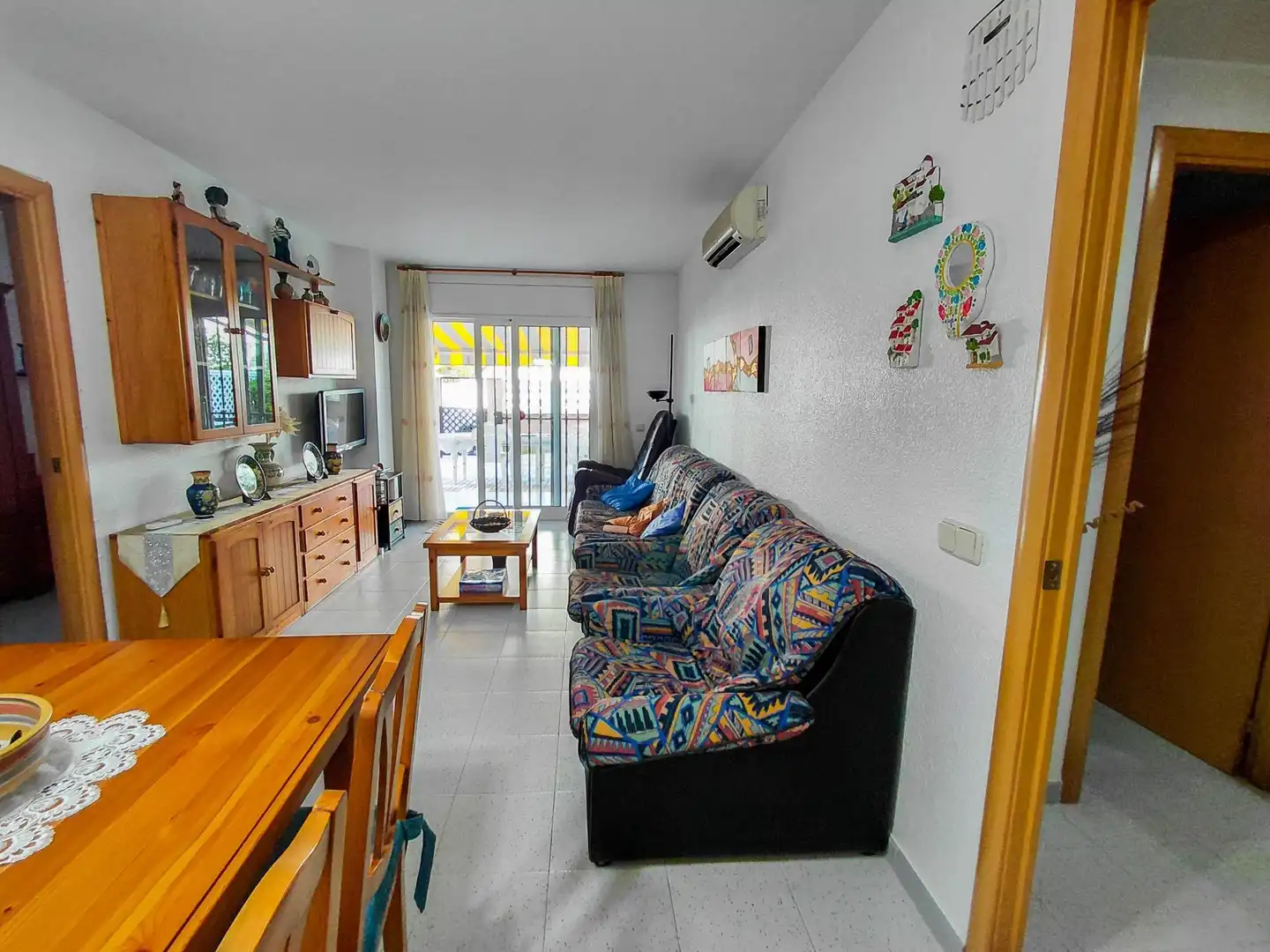 Living room of Ground floor for sale in Cunit  with Air Conditioner, Private garden and Terrace