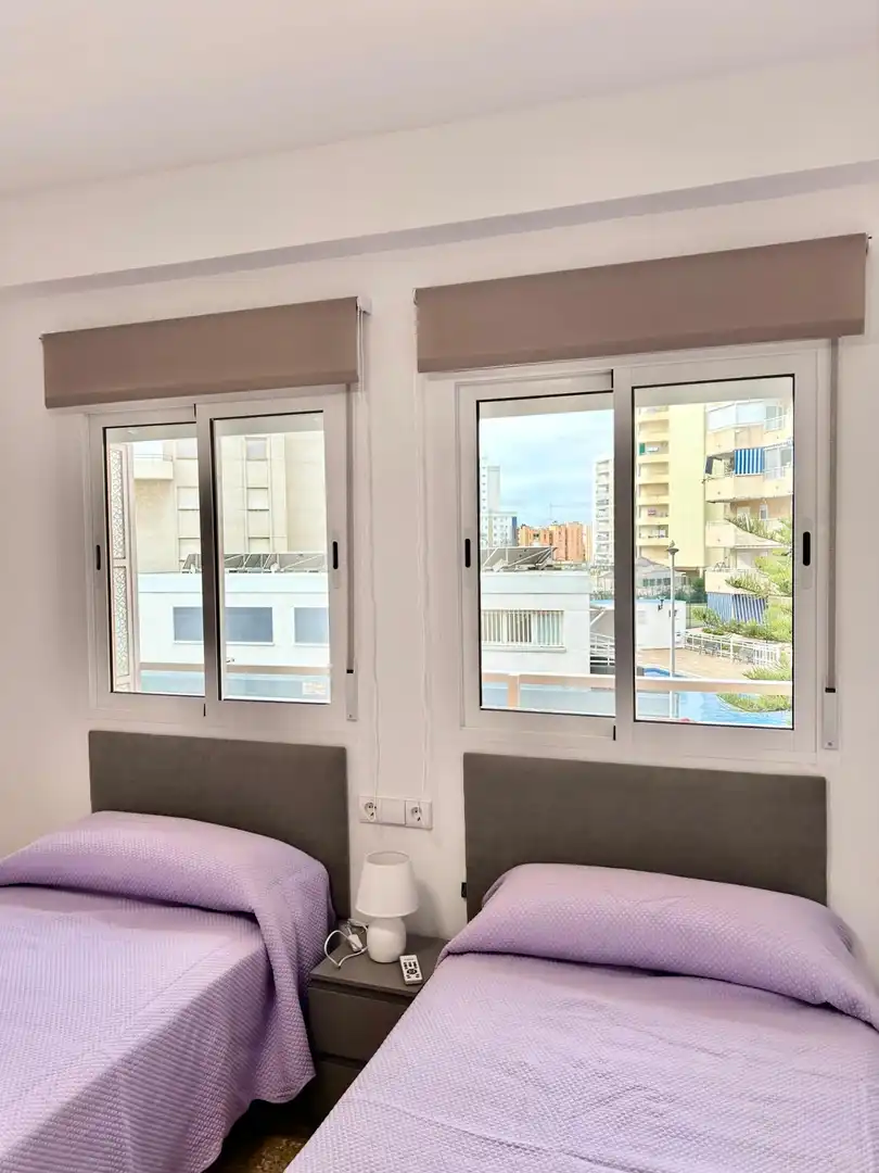 Dormitori de Apartament de lloguer en La Pobla de Farnals amb Aire condicionat, Terrassa i Moblat