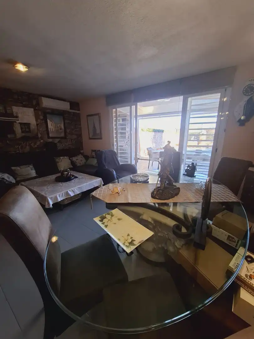 Sala de estar de Casa adosada en venta en Villaviciosa de Odón con Aire acondicionado, Calefacción y Jardín privado