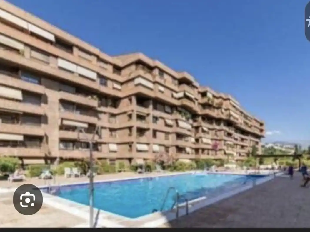 Exterior view of Apartments for sale in  Granada Capital  with Air Conditioner, Swimming Pool and Balcony