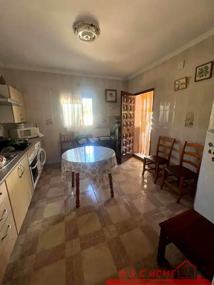Cuina de Casa o xalet en venda en Málaga amb Jardí privat, Terrassa i Traster