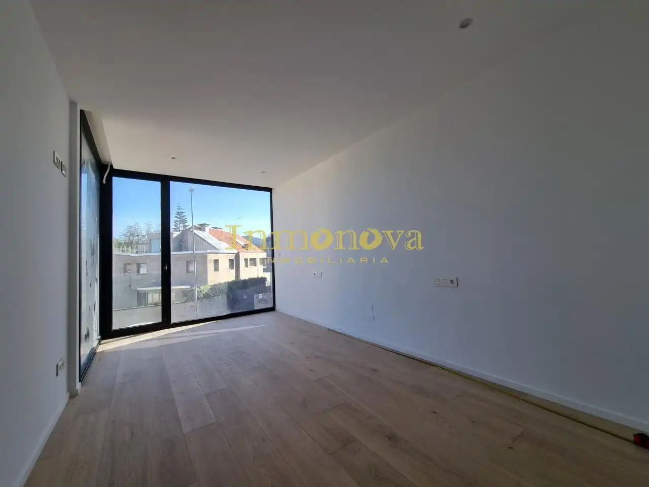 Sala de estar de Casa adosada en venta en Nigrán con Calefacción, Jardín privado y Terraza