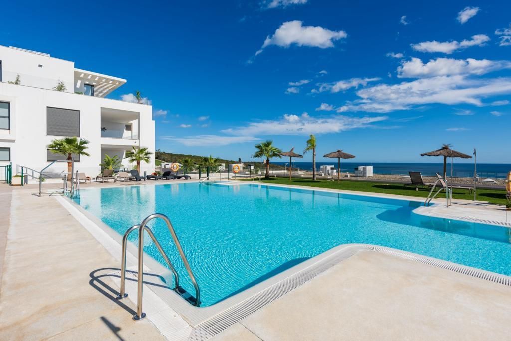 Swimming pool of Flat for sale in La Alcaidesa  with Air Conditioner, Heating and Private garden