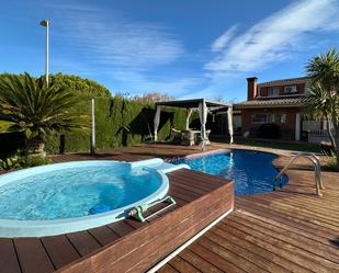 Swimming pool of Single-family semi-detached for sale in Calafell  with Air Conditioner, Terrace and Swimming Pool