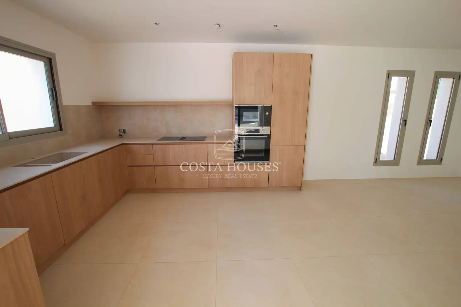 Cuina de Casa o xalet en venda en Moraira amb Aire condicionat, Jardí privat i Terrassa